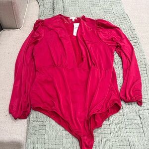 Curvy sense long sleeve bodysuit in fuchsia size 3X.